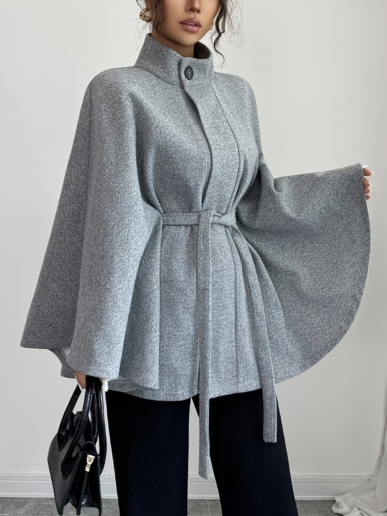 Women’s cape coat with waist tie and stand-up collar