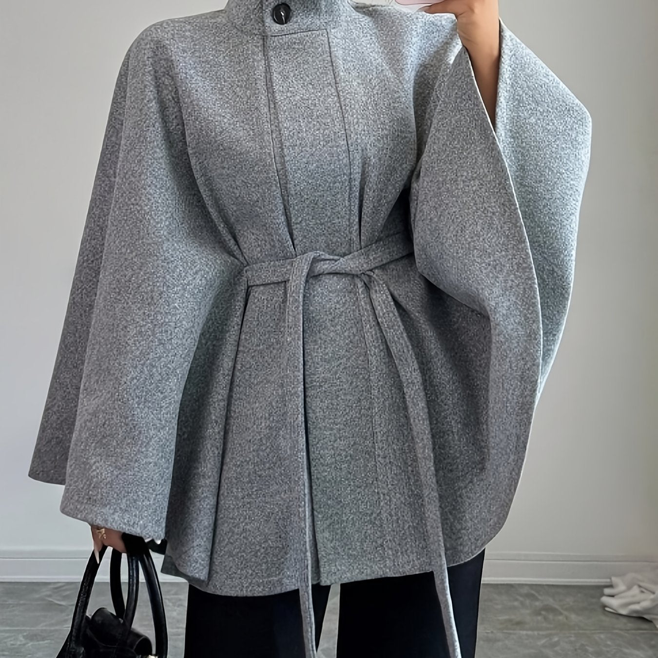 Women’s cape coat with waist tie and stand-up collar